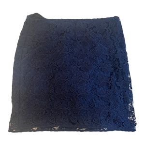 Pencil skirt with lace overlay.